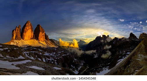 Panoramic view of Tre Cime mountain at sunrise, Tre Cime di Lavaredo National Park, Dolomites, Italy - Shutterstock ID 1454345348