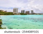 Panoramic View of Tumon Bay with City Skyline and Clear Waters