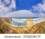 Panoramic view of Twelve Apostles and surrounding ocean, iconic Australian landmark during daytime