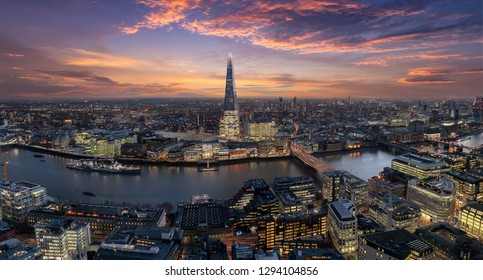 Panoramic View To The Urban Skyline Of London, UK, Along The River Thames Just After Sunset Time