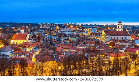 Panoramic view of Vilnius Oldtown townscape against sky at sunset at February