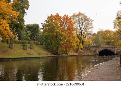 A Panoramic View Of A Water Channel In A Park In Riga 