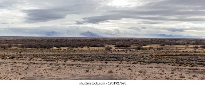 Panoramic View Of Wide Open Desert Vista On Overcast Day In Rural New Mexico