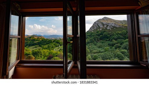 Panoramic view from a window in a rural guesthouse near Arriondas, Asturias, Spain.