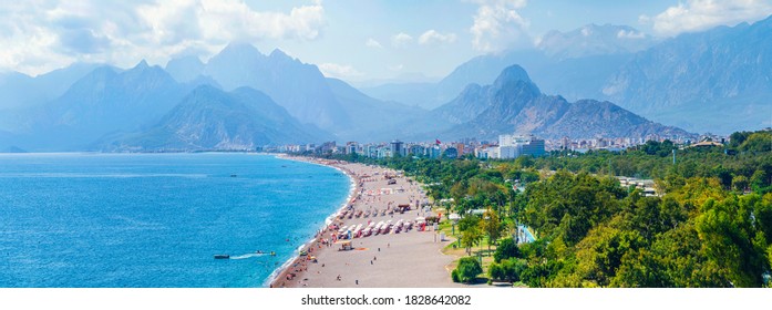 Panoramic views of Antalya and the Mediterranean coast and the beach and beautiful mountains in the clouds. Antalya, Turkey - Shutterstock ID 1828642082