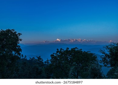Panoramic views of Nanda Devi Mountain Range in the evening while Sun is setting