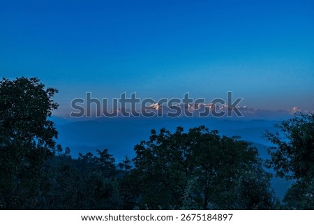 Panoramic views of Nanda Devi Mountain Range in the evening while Sun is setting