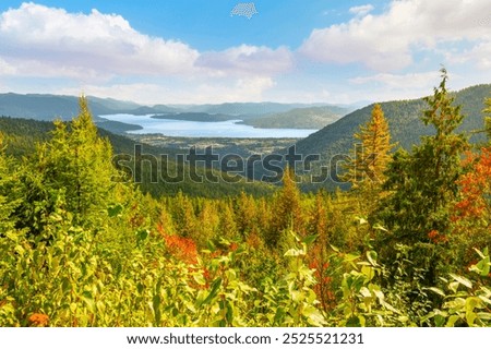 Panoramic wide angle view from Schweitzer Mountain and resort of the towns of Kootenai, Ponderay and Sandpoint, Idaho, along the shores of Lake Pend Oreille, in Sandpoint Idaho, North Idaho Panhandle.