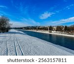 Panoramic winter landscape view with the blue sky on the banks of the San river at Przemysl, Poland 