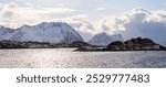 Panoramic winter view of fjord and mountains on Senja island. Norway, Scandinavia, Northern Europe