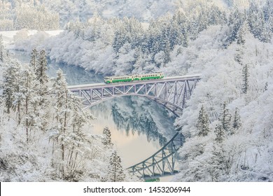 Panoramic Winter View of Tadami Railway Line And Bridge Reflection in The Valley of Tadami River, Mishima Machi, Aizu, Fukushima, Japan