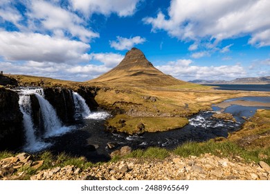 Panoramicview of Kirkjufell mountain and Kirkjufellsfoss waterfall on the Snaefellsnes Peninsula in Iceland - Powered by Shutterstock