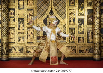 Pantomime (Khon) Hanuman is traditional dance drama art of Thai classical monkey masked from the Ramayana with a backdrop of Thai paintings in a public place at Wat Phra Khao, Ayutthaya, Thailand