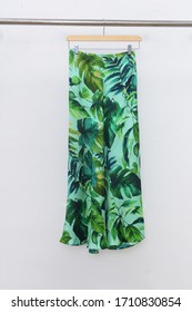 Pants With Floral ,palm Print, Isolated On Gray Background


