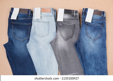 Pants Jeans Of Different Colors Lined Up In A Row, Concept Clothes