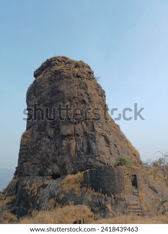 Panvel, Maharashtra, India - January 27, 2024: A view of the funnel shaped vertical rock at the famous Karnala Fort   