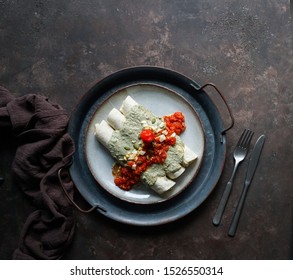 Papadzules Traditional Dish From The Yucatán Peninsula -  Corn Tortillas Dipped In A Sauce Of Pumpkin Seeds Filled With Boiled Eggs, Hot Sauce