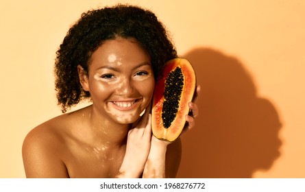 Papaya Cosmetics For Depigmentation Of A Woman's Skin Face With Vitiligo. Skin Care With Features, Beige Background