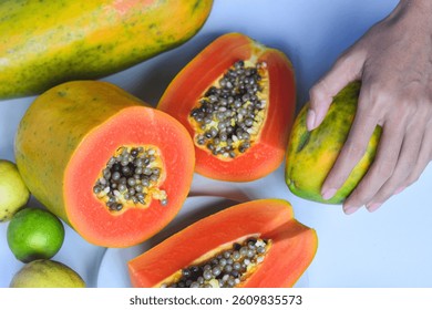 Papaya fruit (Carica papaya) in isolated white background, (papaya on white background)