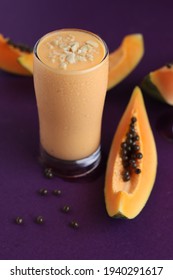 Papaya Milk Shake Is Made Ripen Pappaya Milk And A Scoop Of Vanilla Icecream. Topped With Cashew Nuts