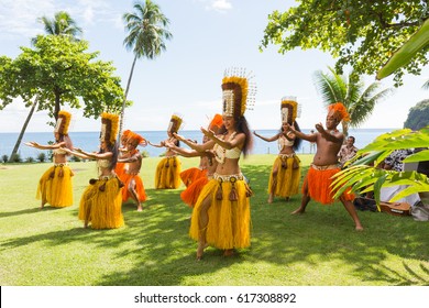 PAPEETE, FRENCH POLYNESIA - APRIL 7, 2017: Polynesian women perform traditional dance in Tahiti Papeete. Polynesian dances are major tourist attraction of luxury resorts of French Polynesia.