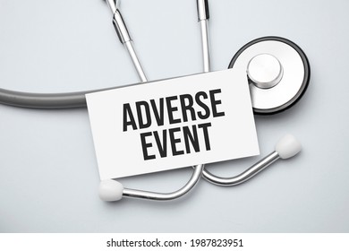 Paper With Adverse Event On A Table And Grey Stethoscope