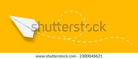 Paper airplane with a dashed line on yellow background
