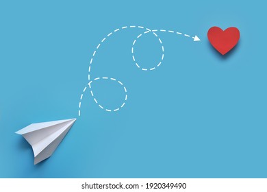 A Paper Airplane, A Heart, And A Path To The Heart. A Symbol Of The Desire To Achieve Love