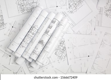 Paper architectural drawings and blueprint - Powered by Shutterstock