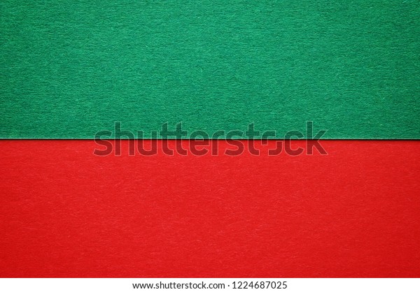 A paper background of two
colors red and green for your text or design, Christmas
concept