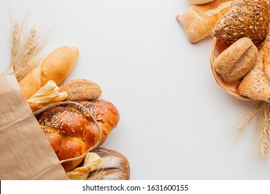 Paper Bag With Bread And Basket Of Pastry 