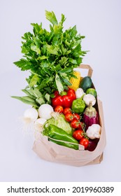 Paper bag with fresh vegetables on white background, grocery shopping - Shutterstock ID 2019960389