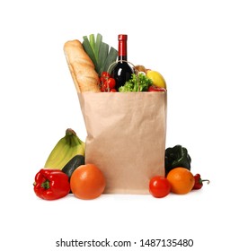 Paper bag with groceries on white background - Shutterstock ID 1487135480