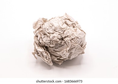 Paper Ball Isolate On White Background.Closeup Of Screwed Up Paper.