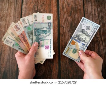 Paper banknotes Russian Rubles vs one hundred american dollar. Russian money rubles face. Closeup of Russian rubles. The concept of inflation mony in Russia, closeup - Shutterstock ID 2157028729