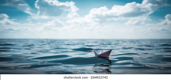 Paper Boat By The Sea