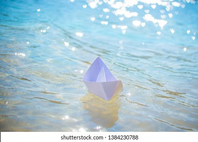 Paper Boat In The Water