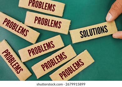 Paper box with the words problems and solutions selected solution. Q and A concept. The concept of solving problems, all problems can be solved. Problem Solving, Clarity, and Strategic Thinking