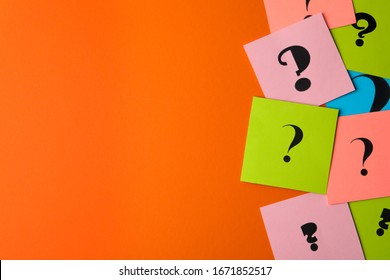 Paper Cards With Question Marks On Orange Background, Flat Lay. Space For Text