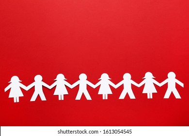 Paper Chain People On Red Background