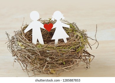 Paper Children With A Heart In Nest - Child Protection Concept