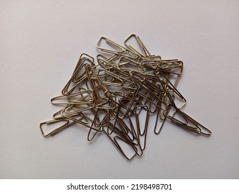 Paper Clips, Office Stationery To Tidy Up Documents.