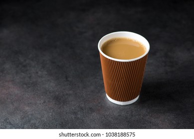 Paper Coffee Cup On Stone Table. Tasty Beverage