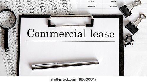 Paper With Commercial Lease On Table With Pen