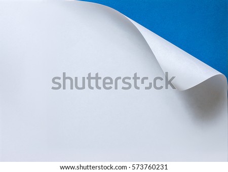 Paper with curled edge.