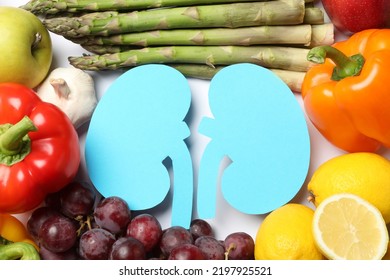 Paper cutout of kidneys and different healthy products on white background, flat lay - Shutterstock ID 2197925521