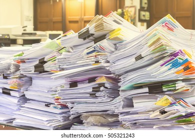 Paper Documents Stacked In Archive