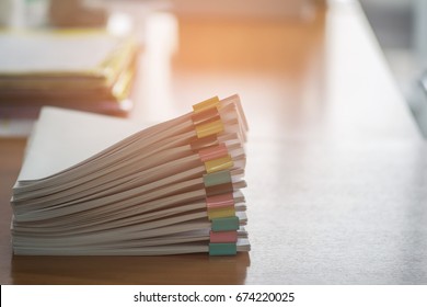 Paper Documents Stacked On Wooden Desk At Workplace.Business Concept.