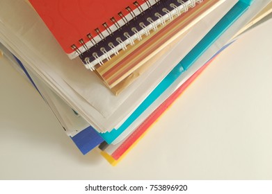Paper documents stacked overlapping