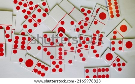 Paper dominoes is often a free time game.                             
